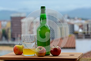 Traditional natural Asturian cider made fromÂ fermented apples in wooden barrels should be poured from great height for air